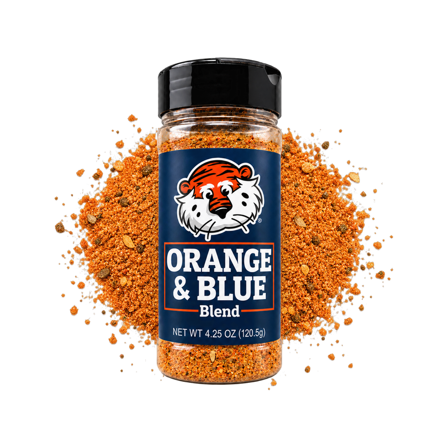 Auburn Orange and Blue Blend jar on a pile of seasoning